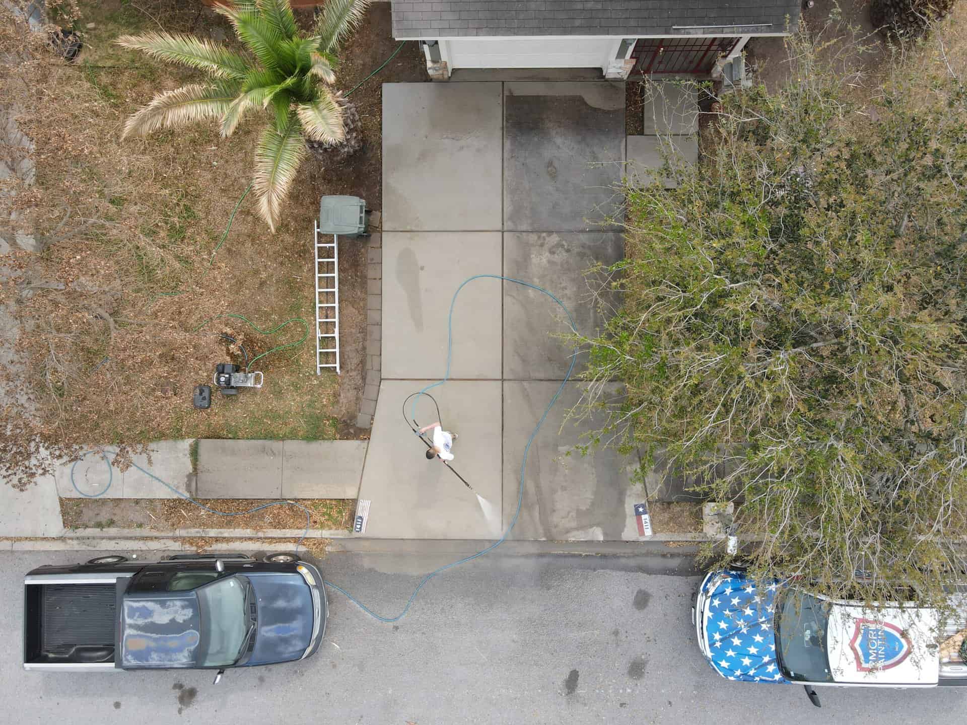 Aerial view of a freshly pressure washed driveway